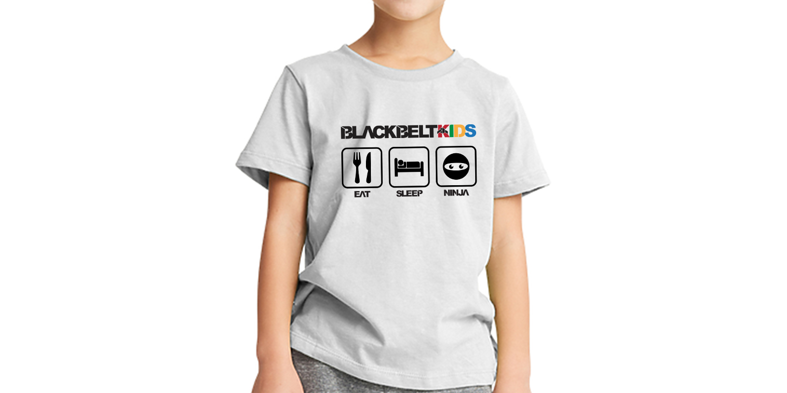 Child wearing a gray t-shirt with 'Blackbelt Kids' logo on a white background