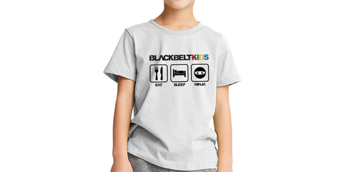 Child wearing a gray t-shirt with 'Blackbelt Kids' logo on a white background